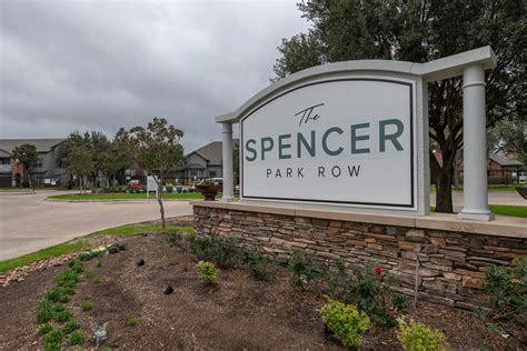 A patio for sitting outside and enjoying the nature feel of living at Spencer Park Row. . The spencer park row